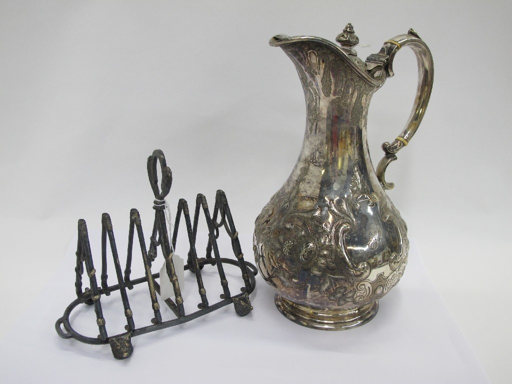 Appraisal: Lot comprising a silver plated claret jug and a toastrack