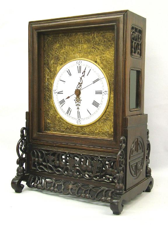 Appraisal: Chinese double fusee table clock the movement striking on a