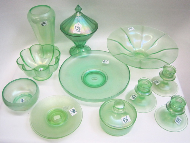 Appraisal: TWELVE PIECES GREEN STRETCH GLASS bowls from to D covered