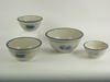 Appraisal: MIXING BOWLS - Lot of four nested stoneware mixing bowls