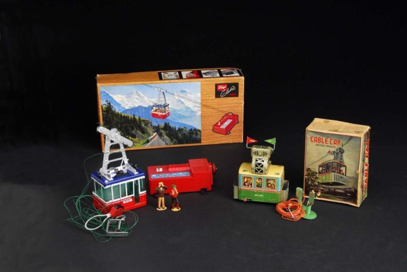 Appraisal: Lot of Cable Car Battery-Operated Toys Description German and Japanese