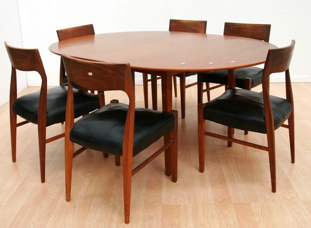 Appraisal: A Danish extension dining table with six chairs