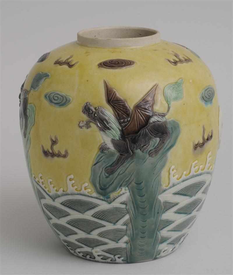 Appraisal: CHINESE BISCUIT-GLAZED PORCELAIN JAR The ovoid body decorated in relief