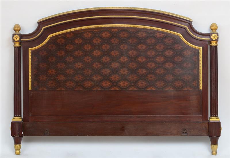 Appraisal: NAPOLEON III GILT-BRONZE-MOUNTED MAHOGANY AND FRUITWOOD MARQUETRY HEADBOARD The arched