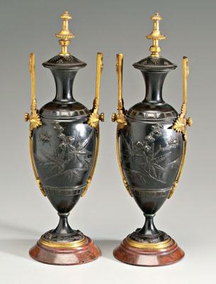 Appraisal: Pair ormolu-mounted bronze urns leaf floral and insect decoration gilt