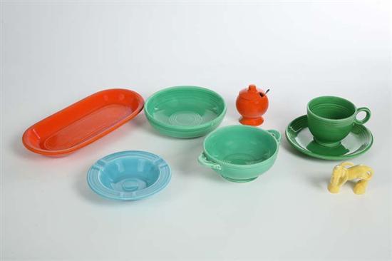 Appraisal: SEVEN PIECES OF FIESTAWARE A yellow donkey h A green