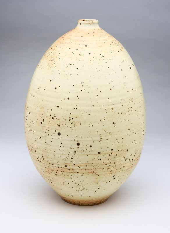 Appraisal: A large Otto Heino cream glazed ceramic speckled cream-glazed stoneware