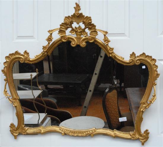 Appraisal: OVER MANTEL MIRROR Carved and gilt rococo style with floral