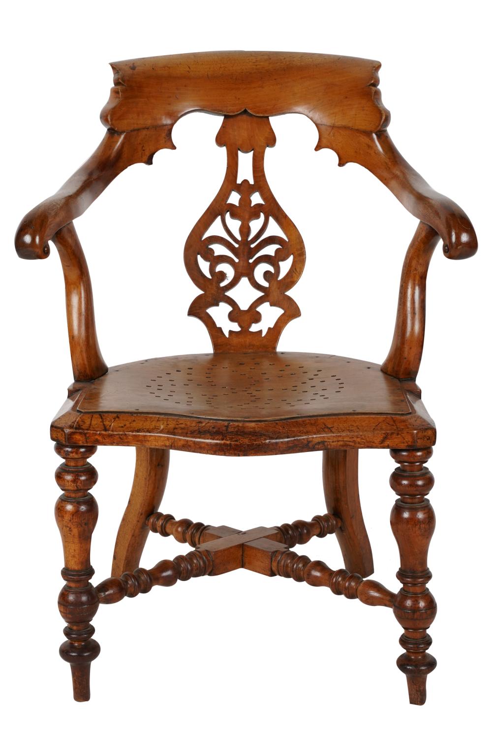 Appraisal: AMERICAN CARVED TURNED FRUITWOOD ARMCHAIR th century with pierced seat