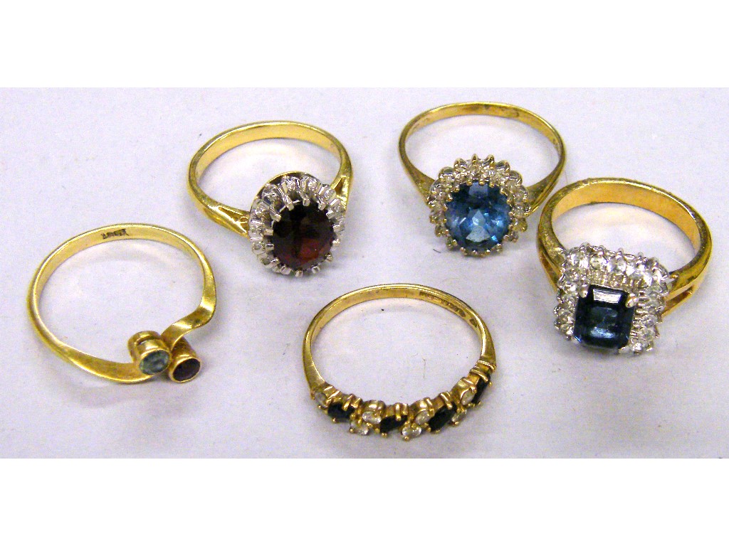 Appraisal: Three gem set cluster rings and two others