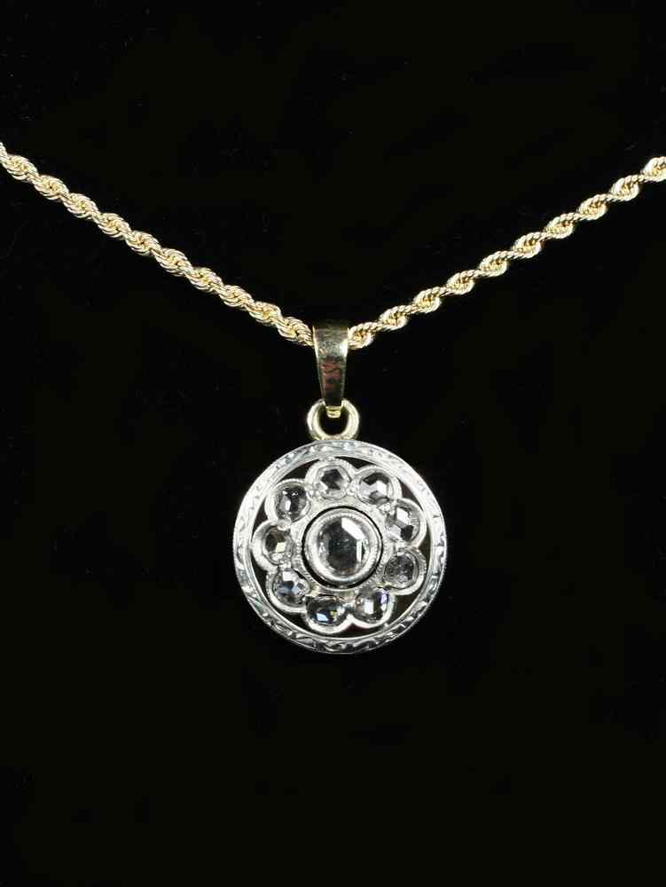 Appraisal: PENDANT - Rose-cut diamond pendant a silver topped gold flowerhead