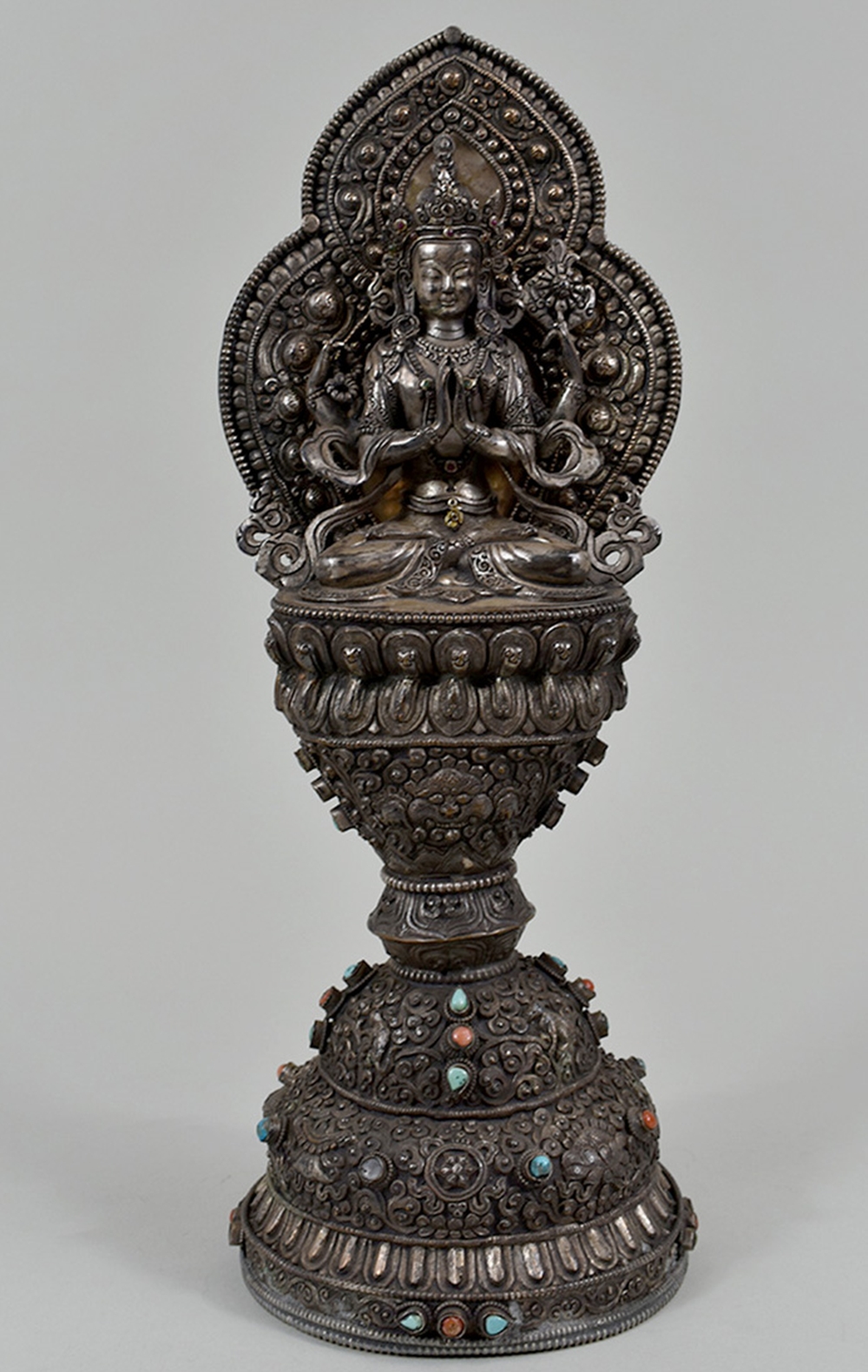 Appraisal: SINO-TIBETIAN SILVERED METAL SEATED BODHIOSATTVALate th th Century The seated