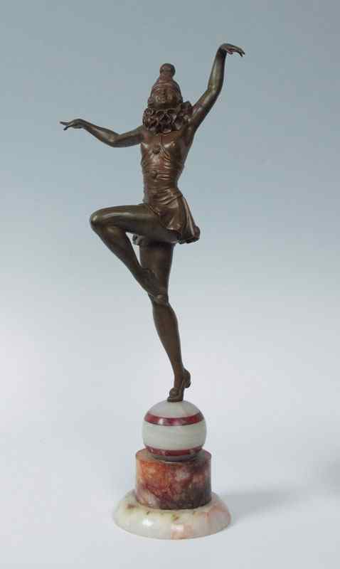 Appraisal: FEMALE HARLEQUIN NUDE DANCER BRONZE ''h '' overall including onyx