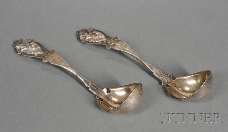 Appraisal: Pair of Duhme Co Silver Stag-Head Sauce Ladles c the