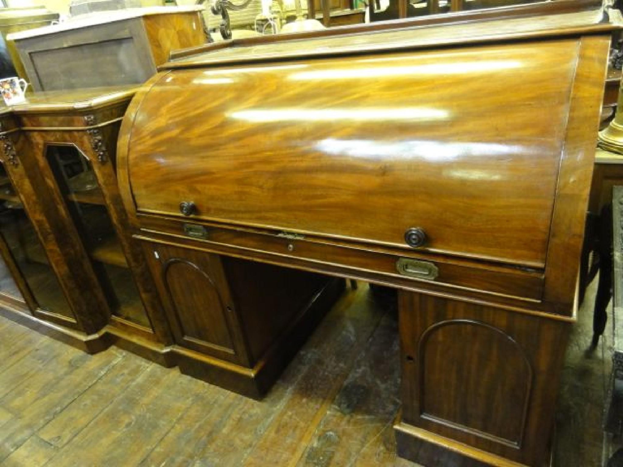 Appraisal: A good example of a th century mahogany cylinder top