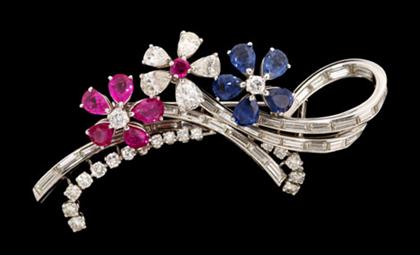 Appraisal: White gold ruby sapphire and diamond brooch Floral tendril brooch