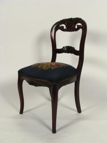 Appraisal: Walnut Victorian Carved Sidechair with floral and leaf carvings and