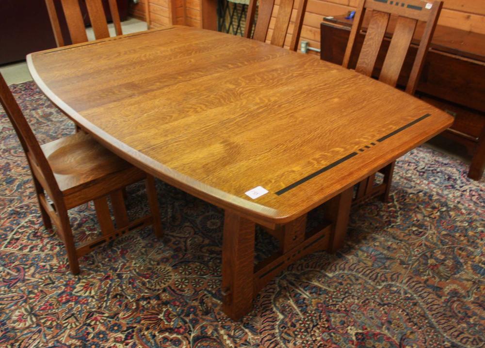 Appraisal: AMISH TRADITIONS OAK DINING TABLE WITH FOUR LEAVES 'Colebrook' Collection