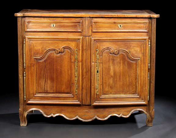 Appraisal: Provincial Louis XV-Style Pine Buffet early th century the rectangular