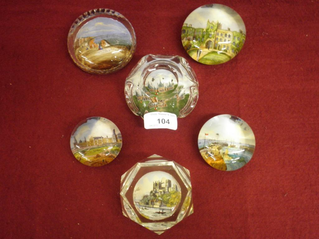 Appraisal: A Victorian moulded glass paperweight inset with a print of