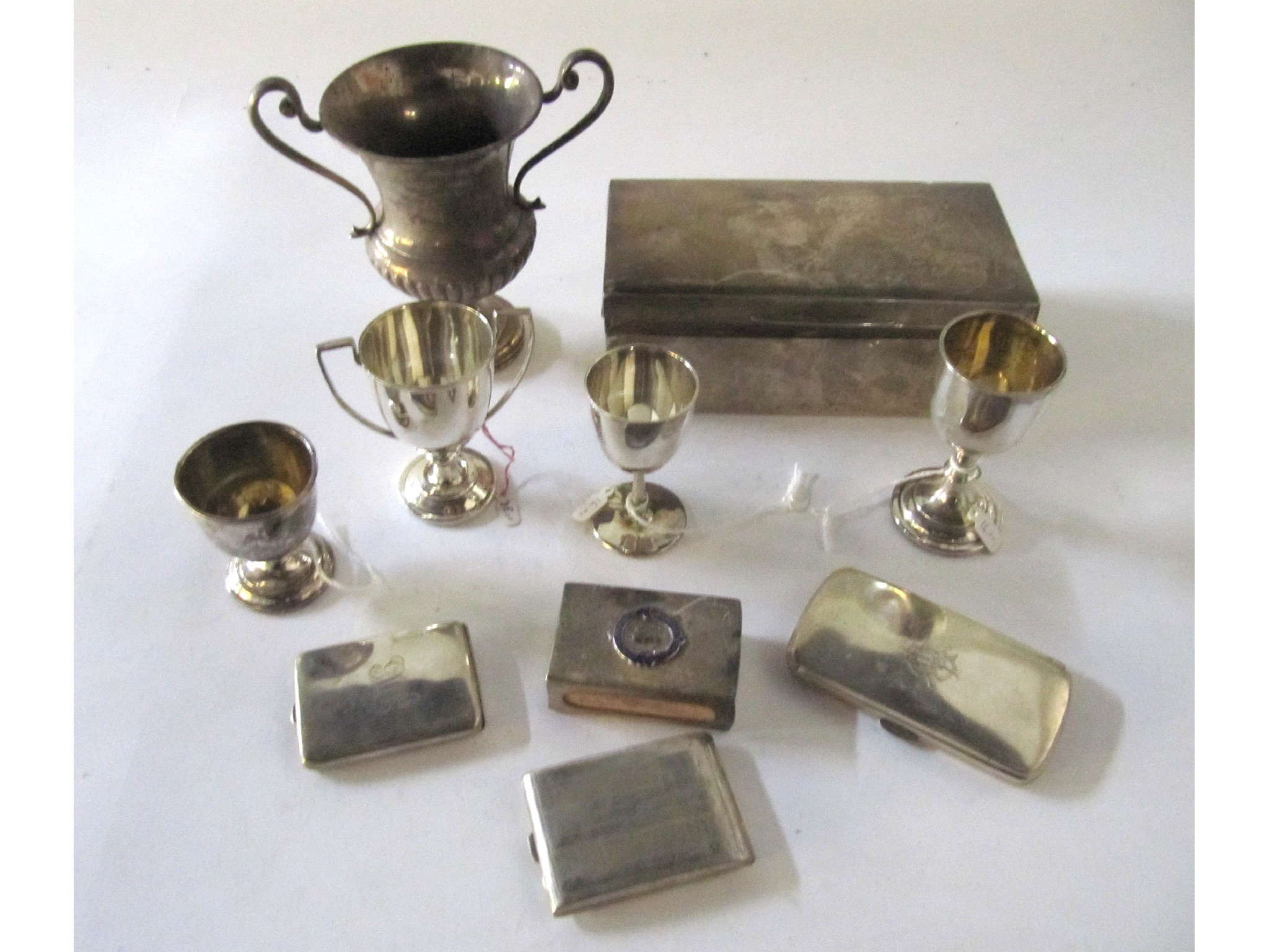 Appraisal: A lot comprising a silver cigarette box trophy cups card