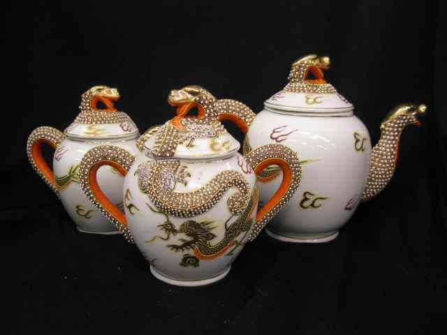 Appraisal: Occupied Japan Dragonware porcelaintea set raised design with moriage gold