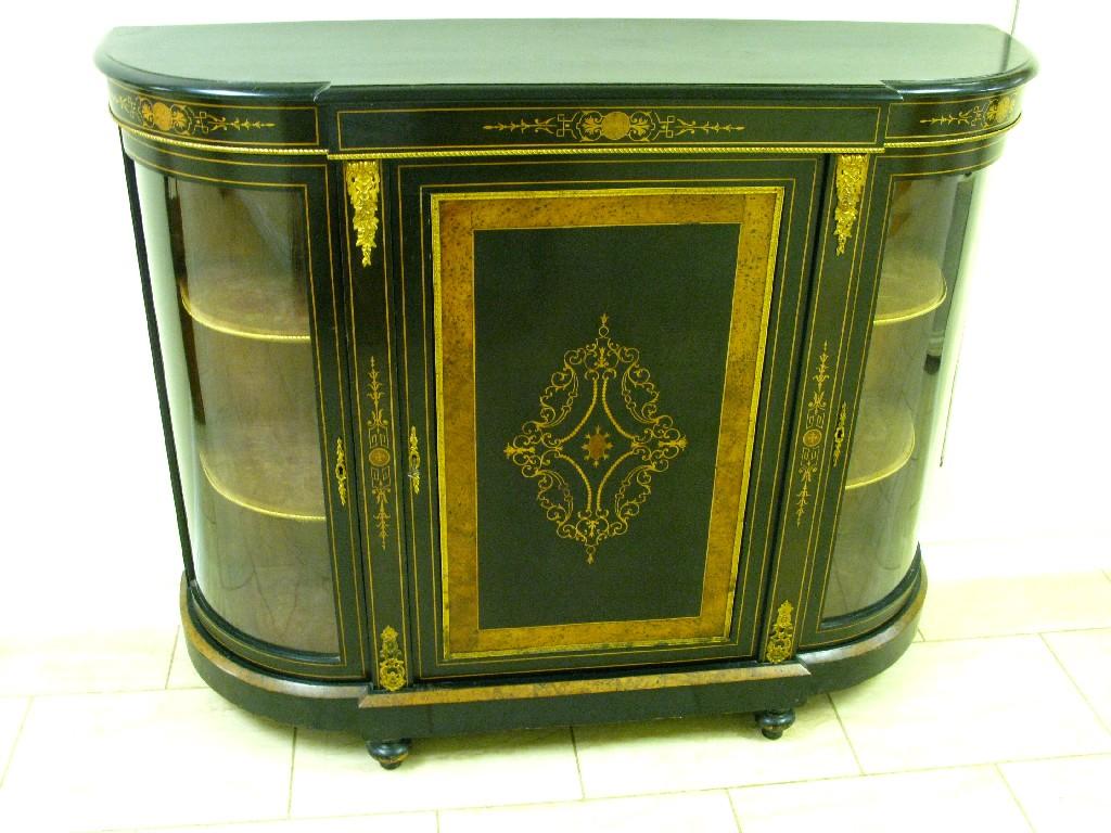 Appraisal: A Victorian ebonised Credenza the central panel door with maple