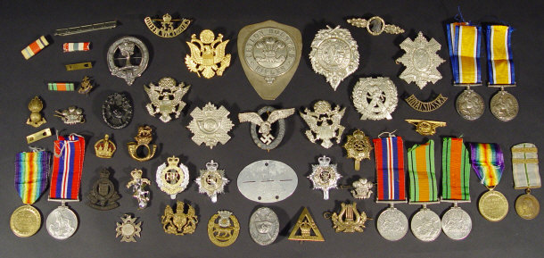 Appraisal: Collection of Military Medals and badges including a World War