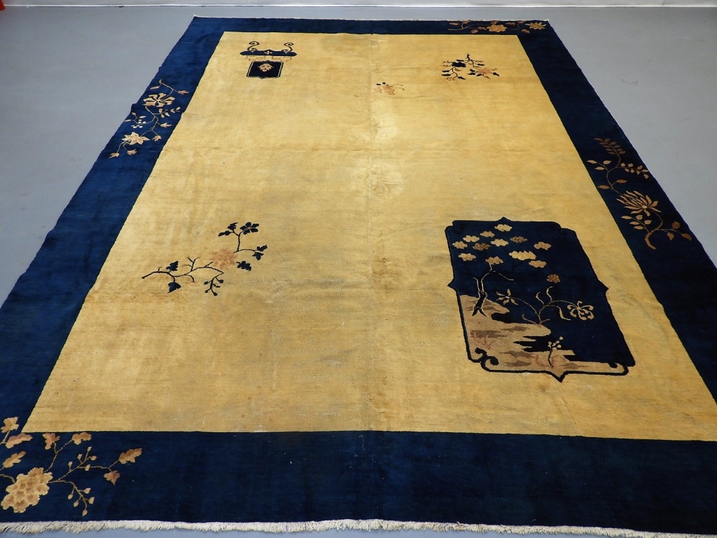 Appraisal: CHINESE ART DECO IVORY NAVY BLUE ROOM SIZE RUG China