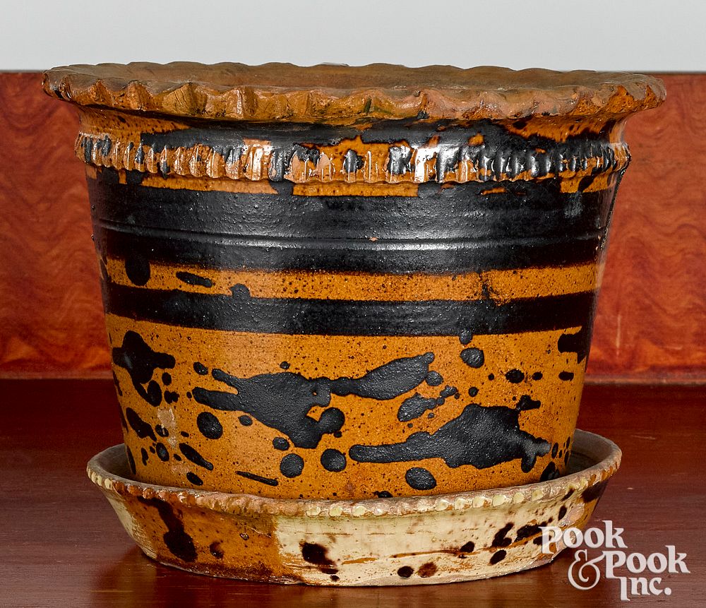 Appraisal: Redware flowerpot and undertray th c Redware flowerpot and undertray