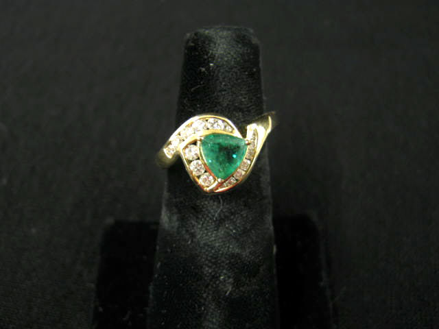 Appraisal: Emerald Diamond Ring carat triangular gem surrounded by diamonds totaling