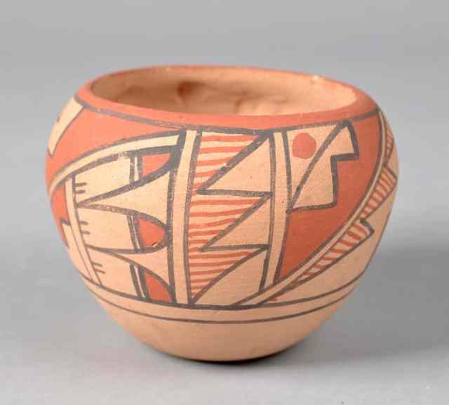 Appraisal: A Native American Pottery JarPainted in geometric designs signed illegible