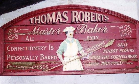 Appraisal: A wooden advertising sign for Thomas Roberts Master Baker cm