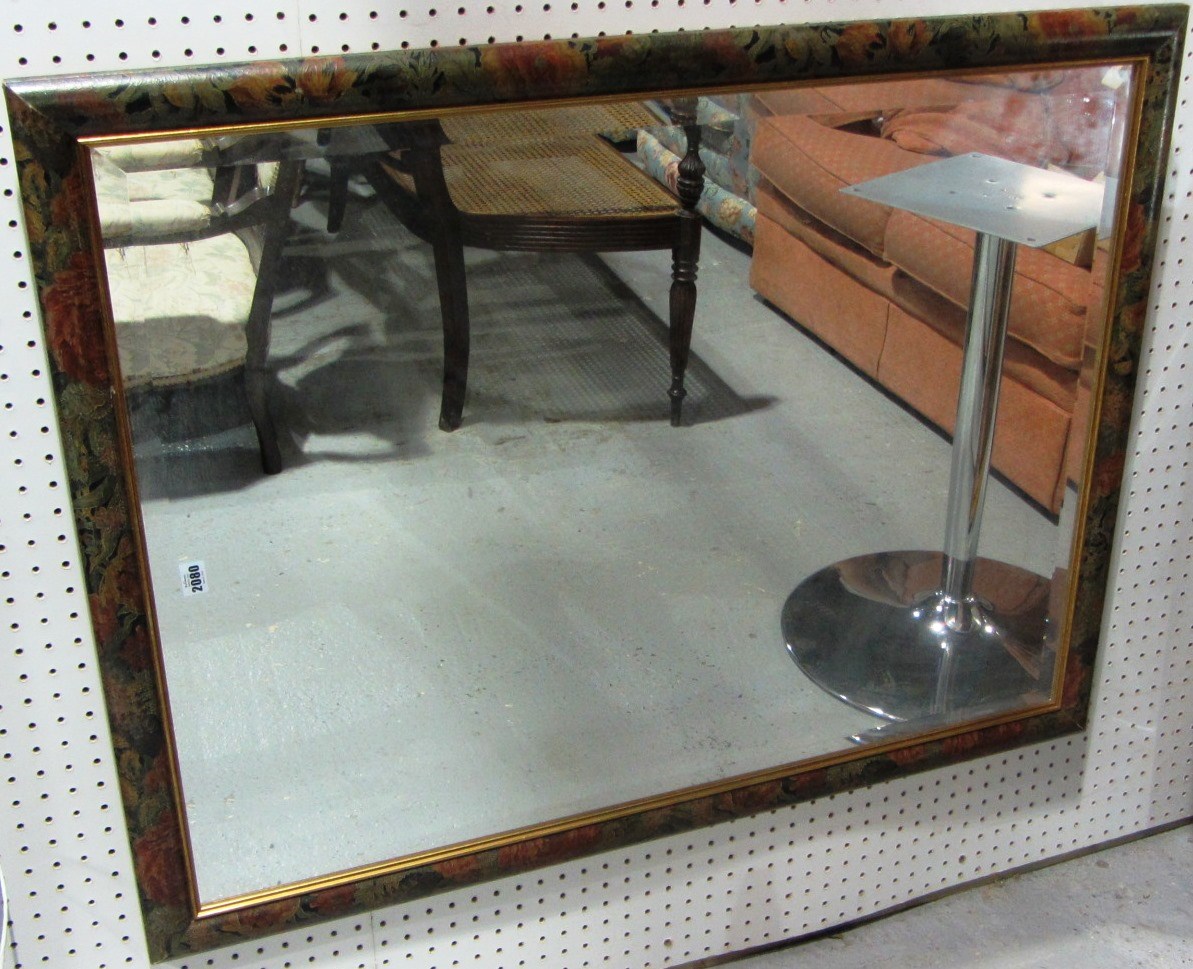 Appraisal: A floral painted rectangular mirror and an oval mahogany mirror