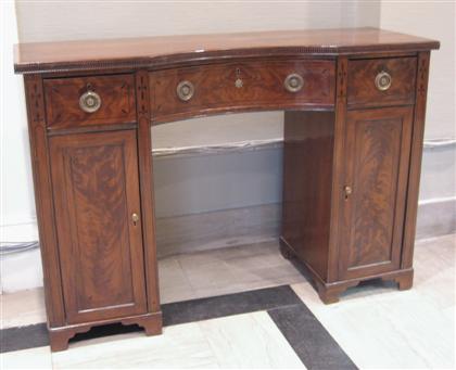 Appraisal: Regency mahogany pedestal sideboard th century The concave top over