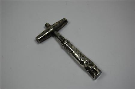 Appraisal: A George III corkscrew by J Taylor probably makers mark