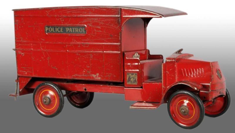 Appraisal: Pressed Steel Steelcraft Police Patrol Toy Description Circa Mack open