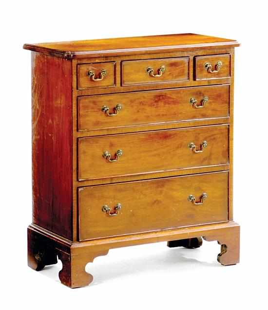 Appraisal: Diminutive English mahogany chest of drawers in the Chippendale form