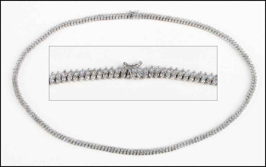 Appraisal: DIAMOND AND KARAT WHITE GOLD NECKLACE Comprised of round brilliant