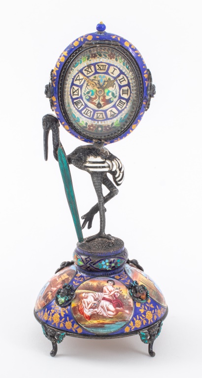 Appraisal: VIENNESE ENAMEL STORK FORM TABLE CLOCK TH C Austrian Viennese