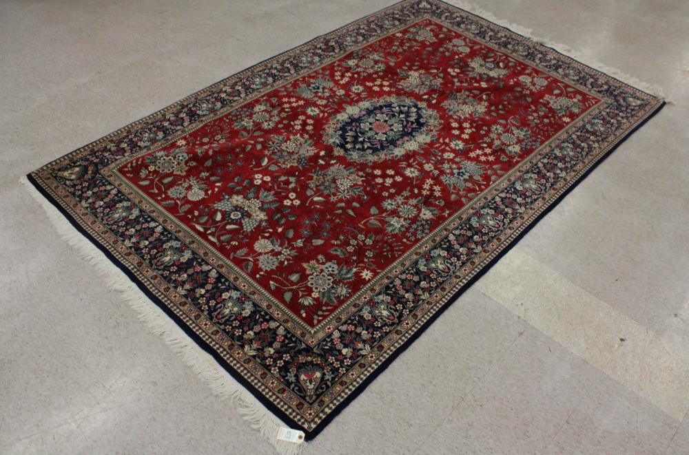 Appraisal: FINE HAND KNOTTED ORIENTAL CARPET Indo-Persian floral and central floral