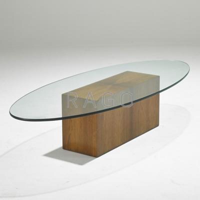 Appraisal: HARVEY PROBBER Coffee table USA s Rosewood and glass Unmarked