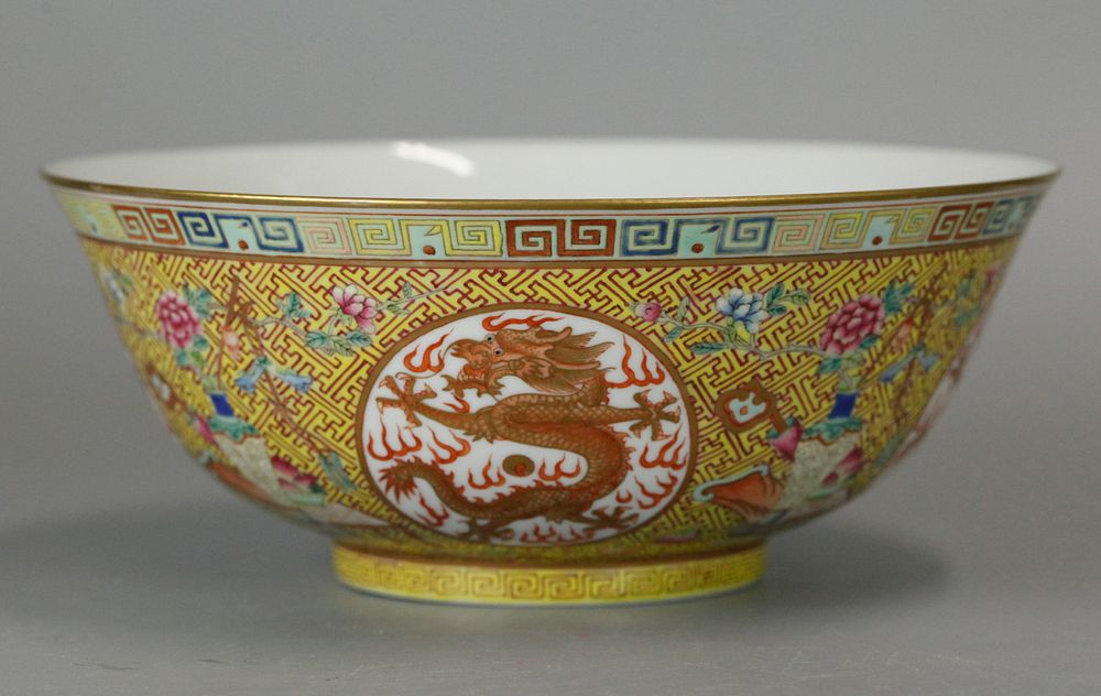 Appraisal: Chinese porcelain bowl w dragon motif dragon motif on yellow