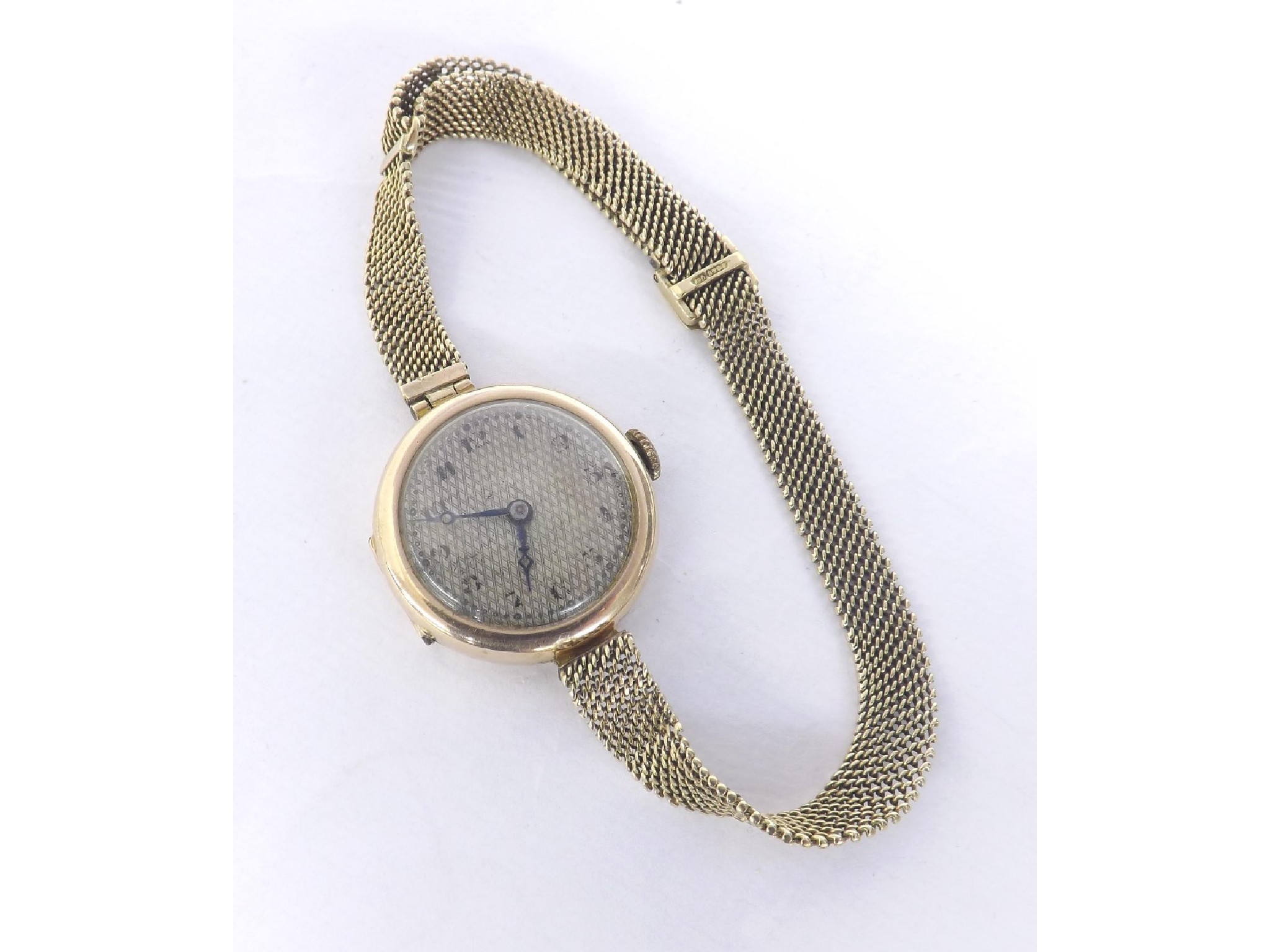 Appraisal: ct lady's wristwatch on a mesh bracelet silvered dial with