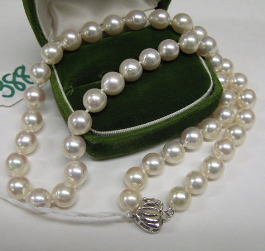 Appraisal: PRINCESS LENGTH PEARL NECKLACE with slightly off-round white pearls and