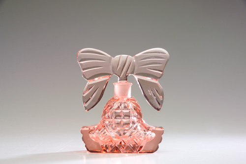 Appraisal: CZECHOSLOVAKIAN Perfume bottle shaped as a bow in pink crystal