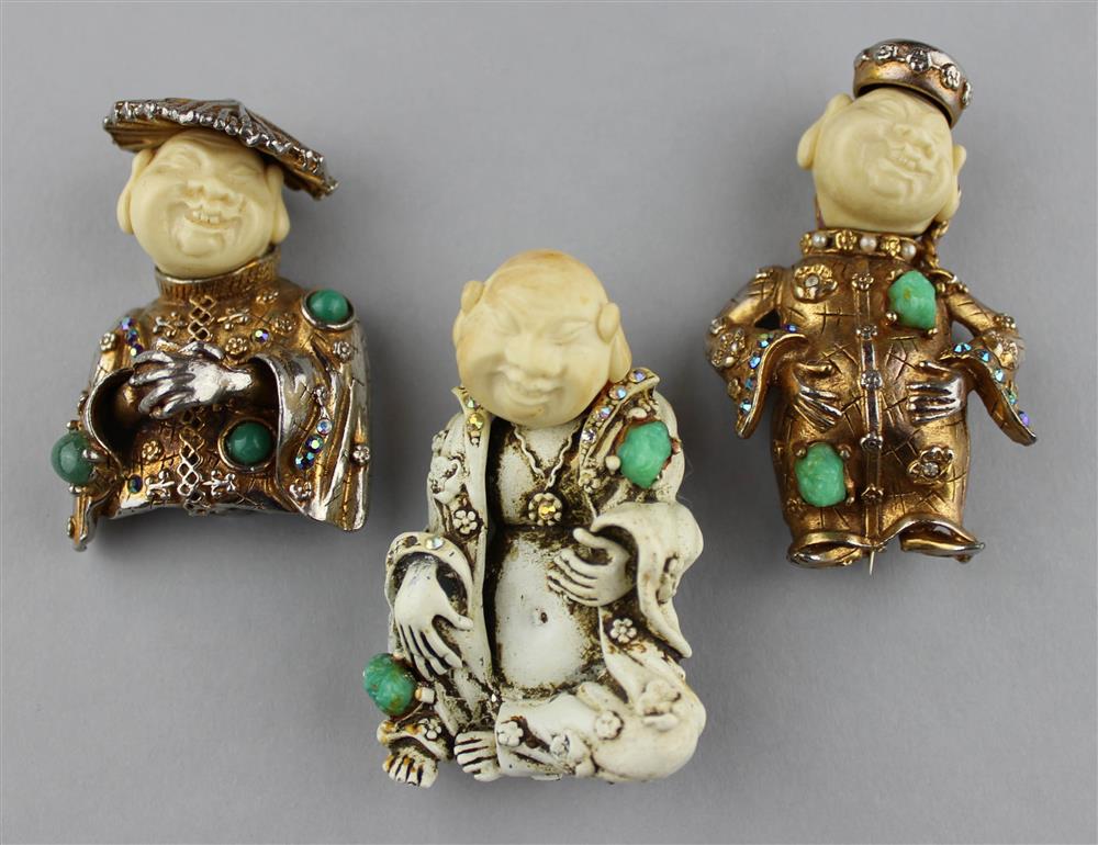 Appraisal: GROUP OF THREE HAR BUDDHA BROOCHES HAR's popular rendition of