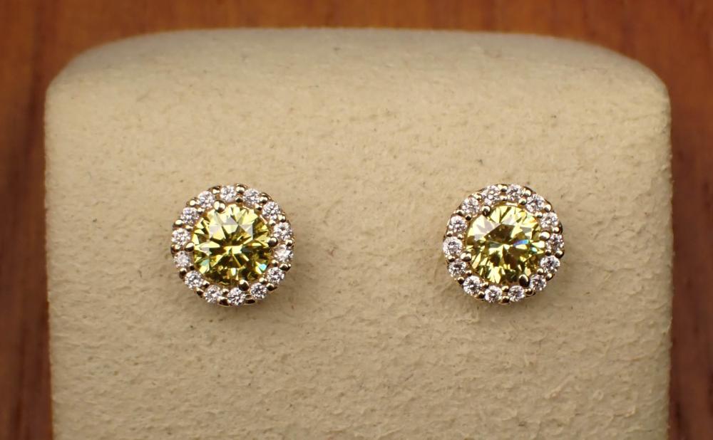 Appraisal: PAIR OF YELLOW AND WHITE DIAMOND EAR STUDS each k