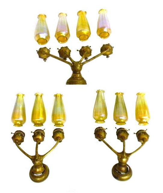 Appraisal: Tiffany set of three sconces circa bronze dore supports with