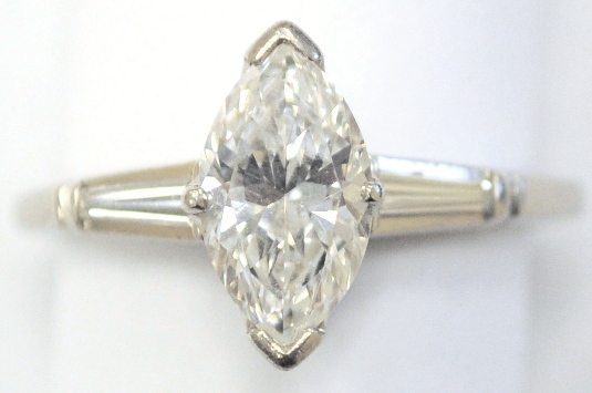 Appraisal: JEWELRY Diamond Engagement Ring iridium platinum one marquise diamond approximately